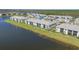 Beautiful condo building with lake view and manicured lawn at 14267 Heritage Landing Blvd # 1223, Punta Gorda, FL 33955