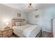 Cozy bedroom showcasing a plush bed and matching wooden bedside table at 14267 Heritage Landing Blvd # 1223, Punta Gorda, FL 33955