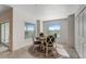 Cozy dining area with natural light, table seating for four, and direct patio access at 14267 Heritage Landing Blvd # 1223, Punta Gorda, FL 33955