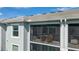 Exterior view of balconies and covered patios on a bright blue day at 14267 Heritage Landing Blvd # 1223, Punta Gorda, FL 33955