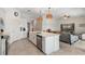 Spacious kitchen with island, stainless appliances, and seamless flow to the cozy living area at 14267 Heritage Landing Blvd # 1223, Punta Gorda, FL 33955