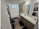 This bathroom features a dual sink vanity with modern fixtures and ample cabinet space at 15431 Orangeade Dr, Punta Gorda, FL 33955