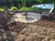 Outdoor fire pit area with chairs, perfect for relaxing evenings at 15431 Orangeade Dr, Punta Gorda, FL 33955