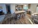 Modern kitchen with a large island and stainless steel appliances at 15431 Orangeade Dr, Punta Gorda, FL 33955
