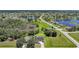 Expansive aerial view of a single Gathering home in a verdant, waterfront community at 16615 Acapulco Rd, Punta Gorda, FL 33955