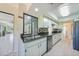 Bright kitchen boasts granite countertops, stainless steel appliances, and ample natural light at 16615 Acapulco Rd, Punta Gorda, FL 33955