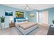 Calming bedroom featuring a comfortable bed, neutral colors, and ample natural light at 18111 Lake Worth Blvd, Port Charlotte, FL 33948