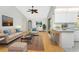 Open-concept living area with a breakfast bar connecting to the adjacent kitchen at 18111 Lake Worth Blvd, Port Charlotte, FL 33948