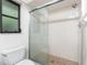 Detail of tiled shower with sliding glass door at 18111 Lake Worth Blvd, Port Charlotte, FL 33948
