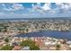 Panoramic aerial view of waterfront homes on canals, showcasing the location at 211 E Tarpon Nw Blvd, Port Charlotte, FL 33952