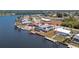 Waterfront home with solar panels, boat dock and screened pool, circled in red at 211 E Tarpon Nw Blvd, Port Charlotte, FL 33952