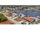 Waterfront homes featuring solar panels and boat docks, circled in red at 211 E Tarpon Nw Blvd, Port Charlotte, FL 33952