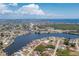Expansive aerial view showcasing the home's prime waterfront location and extensive canal system at 211 E Tarpon Nw Blvd, Port Charlotte, FL 33952