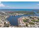 Stunning aerial view shows the property's waterfront location with nearby river, canals, and ocean access at 211 E Tarpon Nw Blvd, Port Charlotte, FL 33952