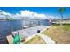 Dock with a boat lift on the canal at 211 E Tarpon Nw Blvd, Port Charlotte, FL 33952