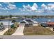 Waterfront property with solar panels, a trailer, and access to the canal, offering both comfort and convenience at 211 E Tarpon Nw Blvd, Port Charlotte, FL 33952