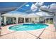 Beautiful screened pool and spa, outdoor seating, with access to the canal at 211 E Tarpon Nw Blvd, Port Charlotte, FL 33952