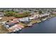 Waterfront home with screened pool, solar panels and boat dock, circled in red at 211 E Tarpon Nw Blvd, Port Charlotte, FL 33952