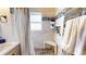 Modern bathroom features a tiled shower, and unique wood paneling at 2142 Gerard Ct, Port Charlotte, FL 33952