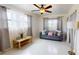 Bright living room with natural light, a comfortable sofa, and stylish decor at 2142 Gerard Ct, Port Charlotte, FL 33952