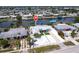 Waterfront home with beautiful landscaping, boat dock, and serene canal views at 21812 Edgewater Dr, Port Charlotte, FL 33952