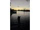 Sunset view of waterway from wooden dock at 21812 Edgewater Dr, Port Charlotte, FL 33952
