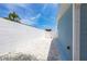 Clean side yard with privacy wall, providing outdoor space and functionality at 21812 Edgewater Dr, Port Charlotte, FL 33952