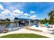 Charming waterfront with seating, dock, boat lift, and stunning water views at 21812 Edgewater Dr, Port Charlotte, FL 33952