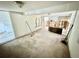 Open basement area ready for renovation with visible shelving and doorway at 23476 Harper Ave, Punta Gorda, FL 33980