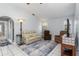 Spacious living room with tile floors, comfortable seating, and neutral paint at 26177 Madras Ct, Punta Gorda, FL 33983