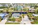 Stunning aerial view of waterfront home showcasing a canal front location and neighborhood at 4231 Hollis Ave, Port Charlotte, FL 33953