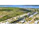Aerial view of a neighborhood on canals leading to the water at 4231 Hollis Ave, Port Charlotte, FL 33953