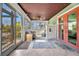 Bright sunroom featuring tile floors, ceiling fan and furniture at 4231 Hollis Ave, Port Charlotte, FL 33953