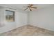 Bedroom with tile flooring, closet, and plenty of natural light from the window at 4282 Pocatella Ave, North Port, FL 34287