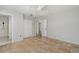 Bedroom featuring neutral walls, tile flooring, closet, and access to bathroom at 4282 Pocatella Ave, North Port, FL 34287