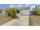 Charming single-story home features a two-car garage and well-maintained lawn at 4282 Pocatella Ave, North Port, FL 34287