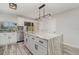 Bright kitchen with a large island, stainless appliances, and an adjacent eating area at 4282 Pocatella Ave, North Port, FL 34287