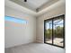 Bright bedroom with a sliding glass door leading to the outdoor pool area at 7149 Sea Mist Dr, Port Charlotte, FL 33981
