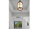 Open entryway with a decorative chandelier and a view of the pool at 7149 Sea Mist Dr, Port Charlotte, FL 33981