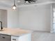 Living area features a shiplap wall, recessed lighting, and modern fixtures, creating a stylish and inviting space at 7149 Sea Mist Dr, Port Charlotte, FL 33981