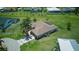 High angle aerial shot displaying roof detail and lush landscaping features at 7505 Carissa, Punta Gorda, FL 33955