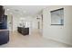 Open floor plan with kitchen, dining area and living room, featuring modern design and natural light at 7505 Carissa, Punta Gorda, FL 33955
