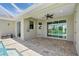 Covered patio area with brick pavers and access to pool, ideal for outdoor entertaining at 7505 Carissa, Punta Gorda, FL 33955