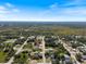 Aerial view showcasing neighborhood with the home marked with a red icon at 8849 Attalla Ave, North Port, FL 34287