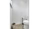 Powder room featuring a toilet and trash receptacle at 9295 Melody Cir, Port Charlotte, FL 33981