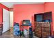 Bedroom with a large window, a bed, a TV, and a chest of drawers at 9295 Melody Cir, Port Charlotte, FL 33981