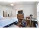 Bedroom featuring a TV, furniture, and access to the rest of the home at 9295 Melody Cir, Port Charlotte, FL 33981