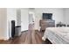 Bedroom featuring a TV and an open view to the rest of the home at 9295 Melody Cir, Port Charlotte, FL 33981