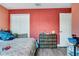Bedroom featuring a bed, dresser with drawers, and a closet with bi-fold doors at 9295 Melody Cir, Port Charlotte, FL 33981
