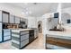 Spacious kitchen with center island, breakfast bar and stainless appliances at 9295 Melody Cir, Port Charlotte, FL 33981